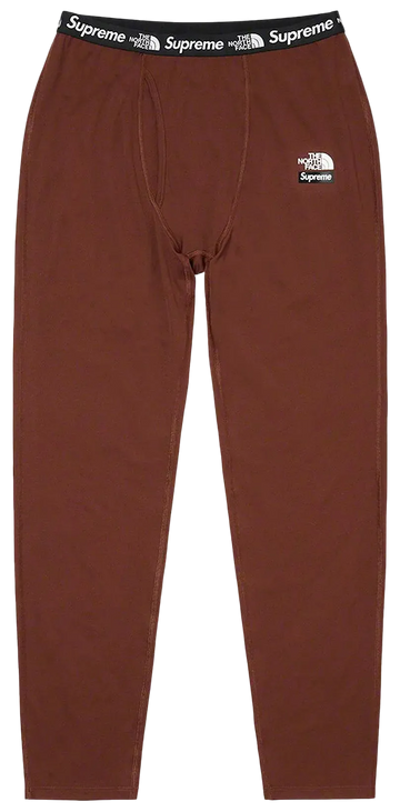 Brown pants with Supreme and The North Face logos on a white background