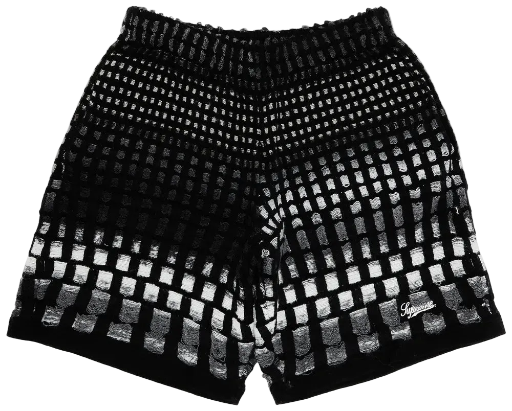 Black shorts with white checkered pattern on a white background