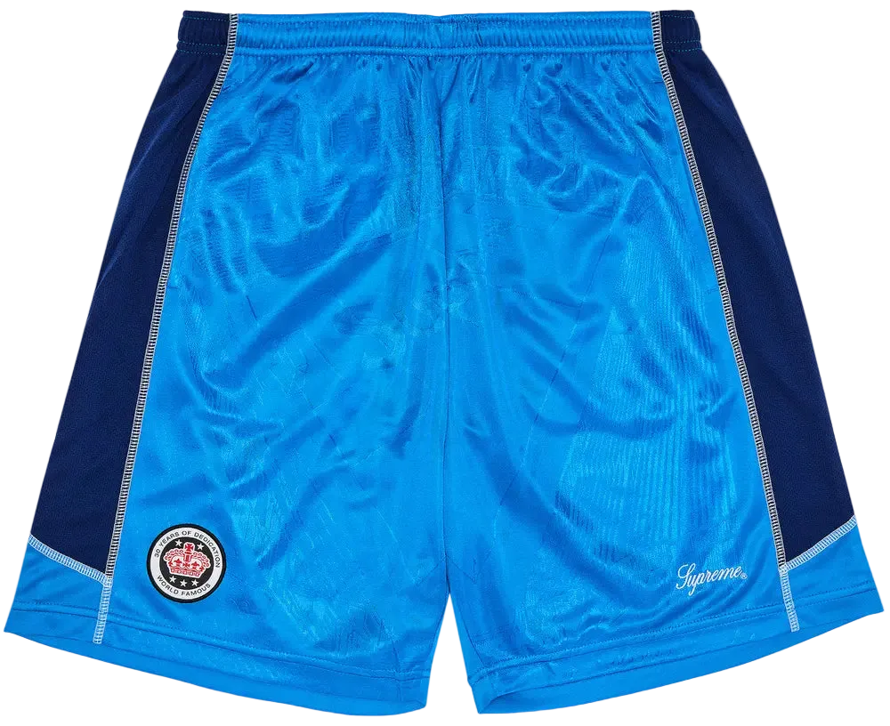 Blue and navy shorts with a logo on a white background