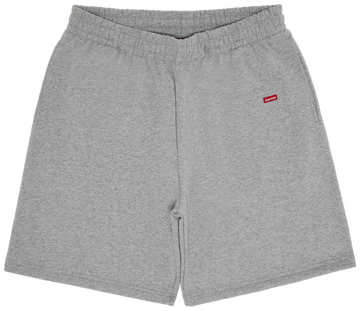 Gray shorts with a red logo on a white background