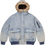 Blue denim jacket with fur-lined hood on a white background