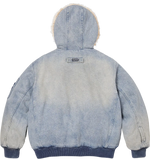 Light blue denim jacket with a hood on a white background