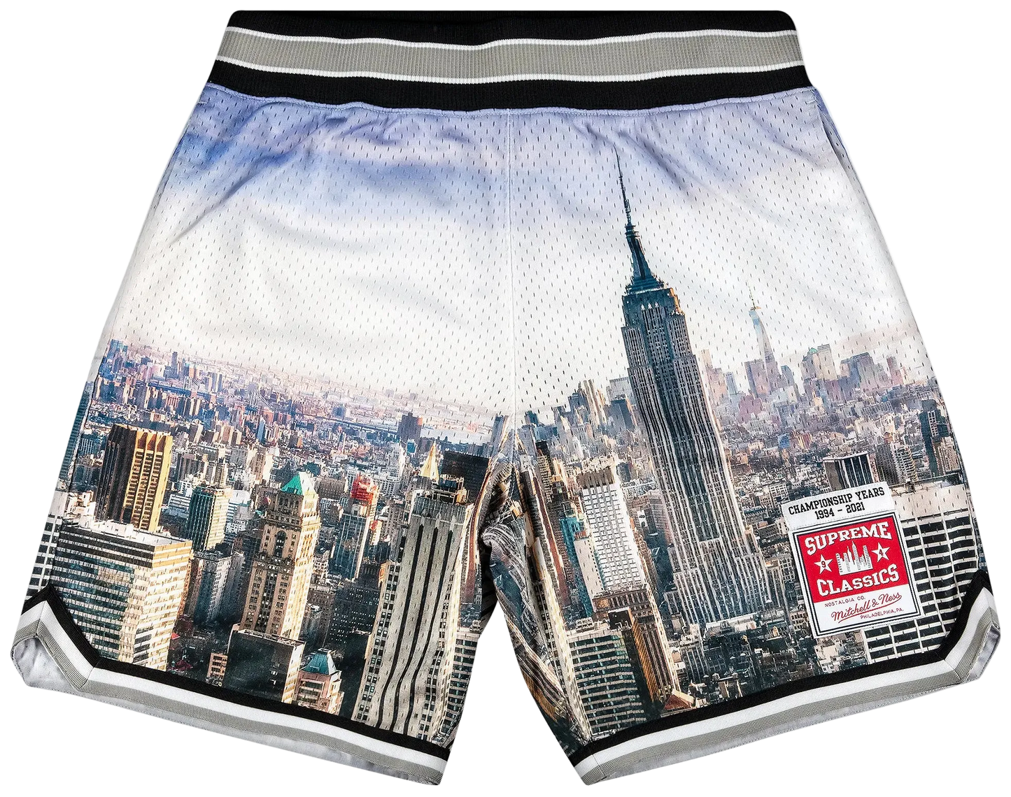 Shorts with a cityscape design featuring the Empire State Building and Supreme logo.