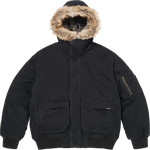 Black winter jacket with fur-lined hood on a white background